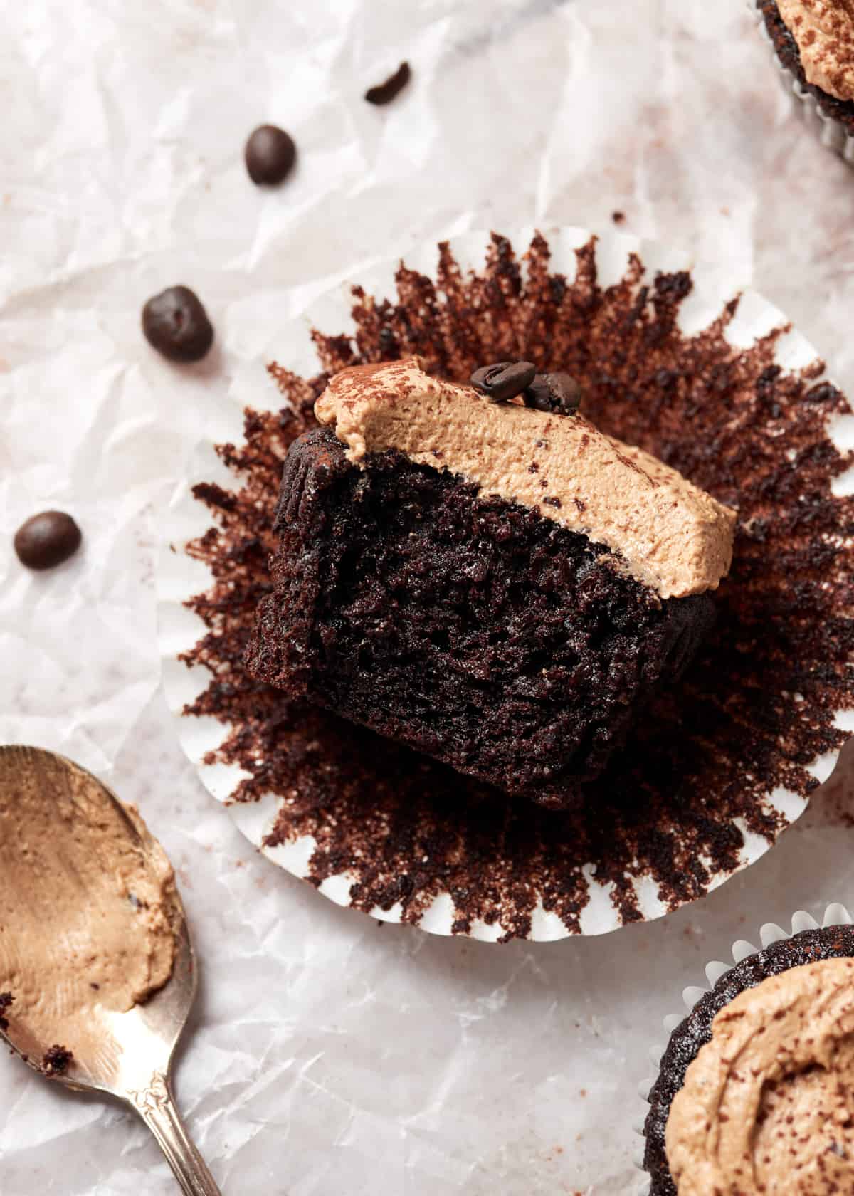 bite shot of a moist mocha cupcake.