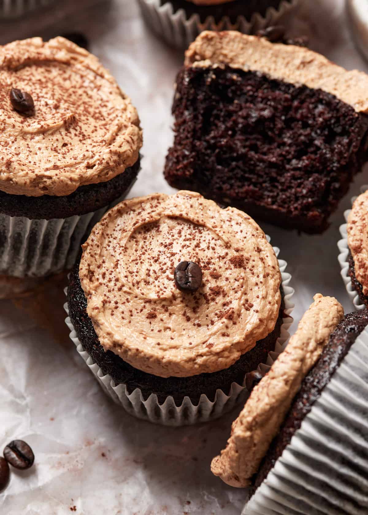 mocha cupcake topped with Russian buttercream frosting and a coffee bean.