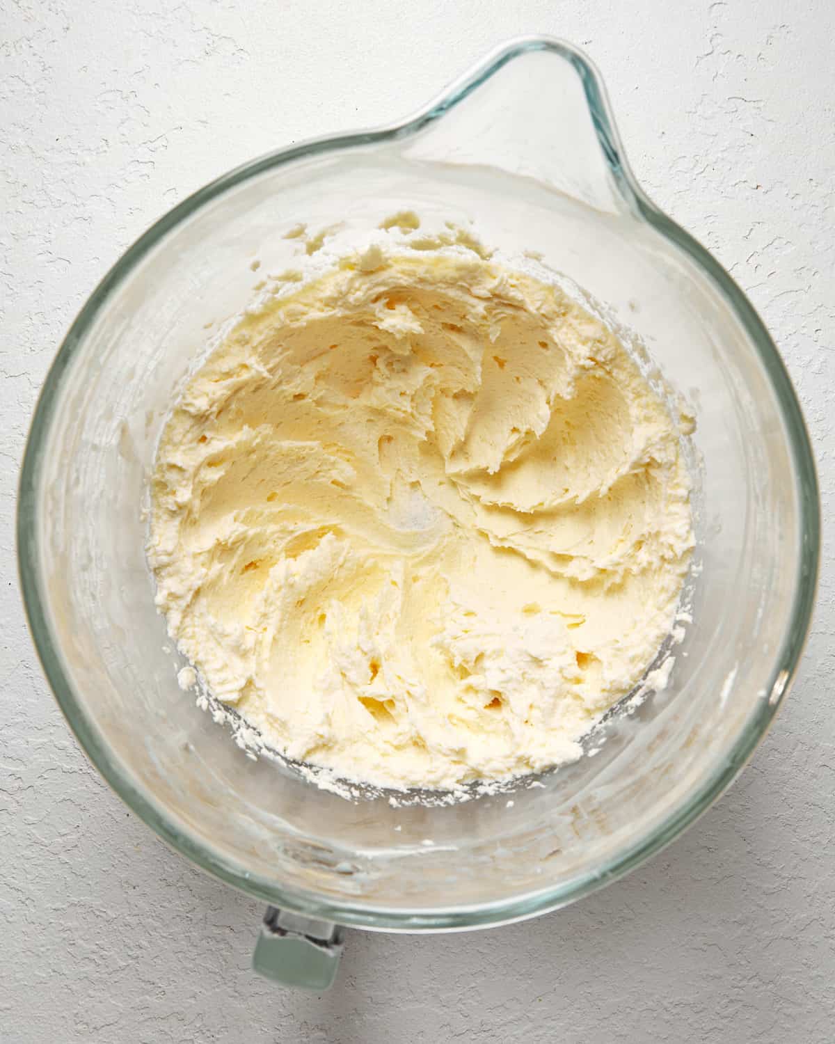 whipped butter in a mixing bowl.