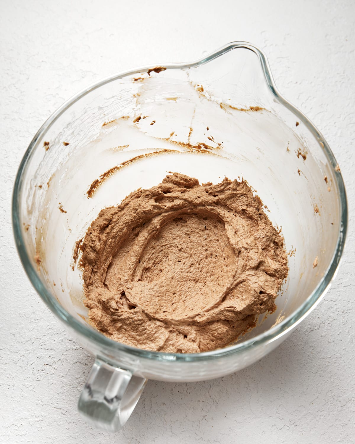 Russian mocha buttercream in a mixing bowl.