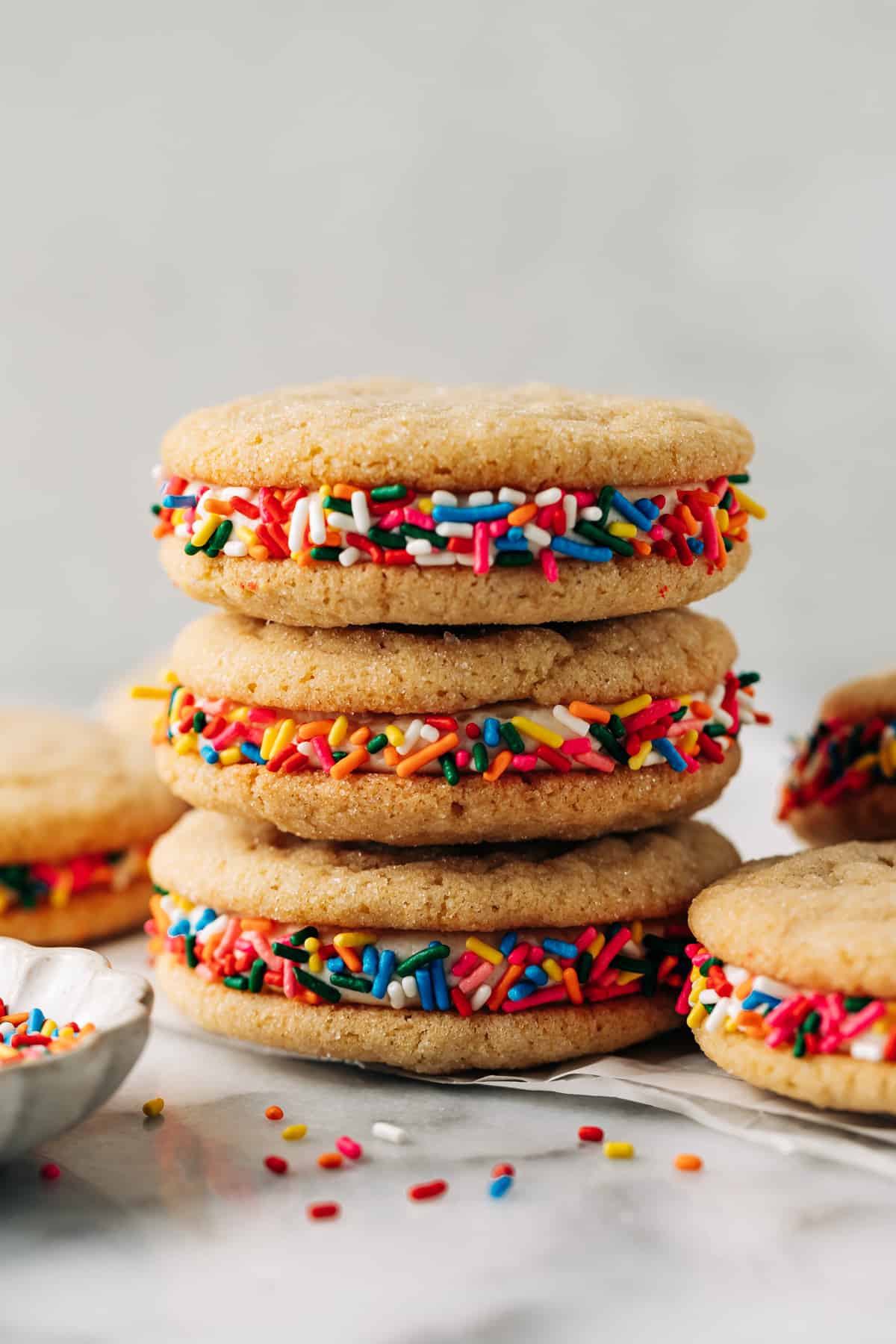 stack of three sugar cookie sandwiches.